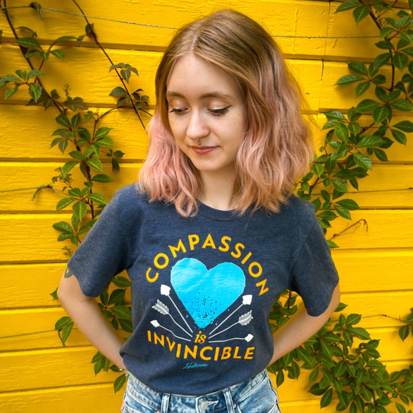 Compassion is Invincible Heather Navy Unisex Tee