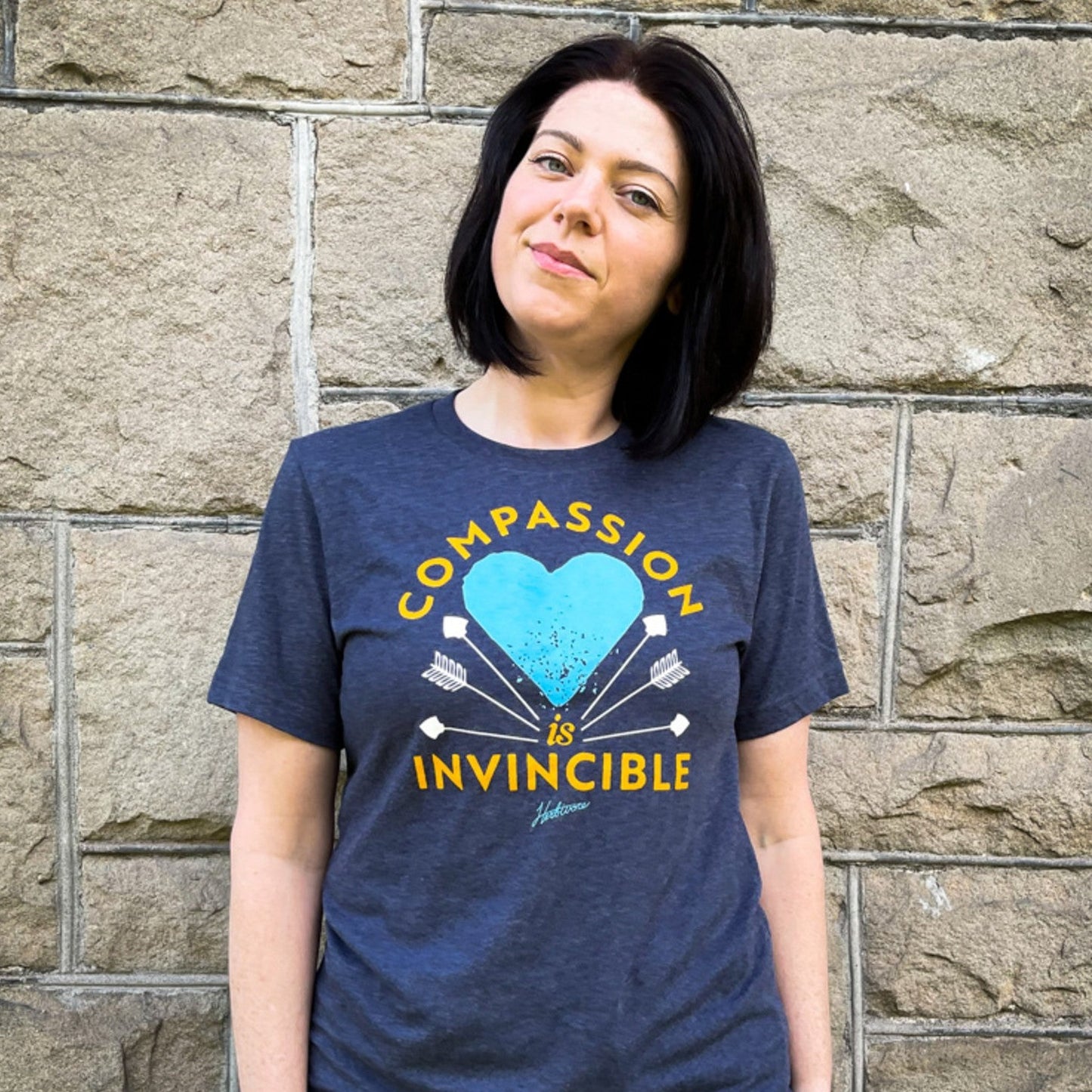 Compassion is Invincible Heather Navy Unisex Tee